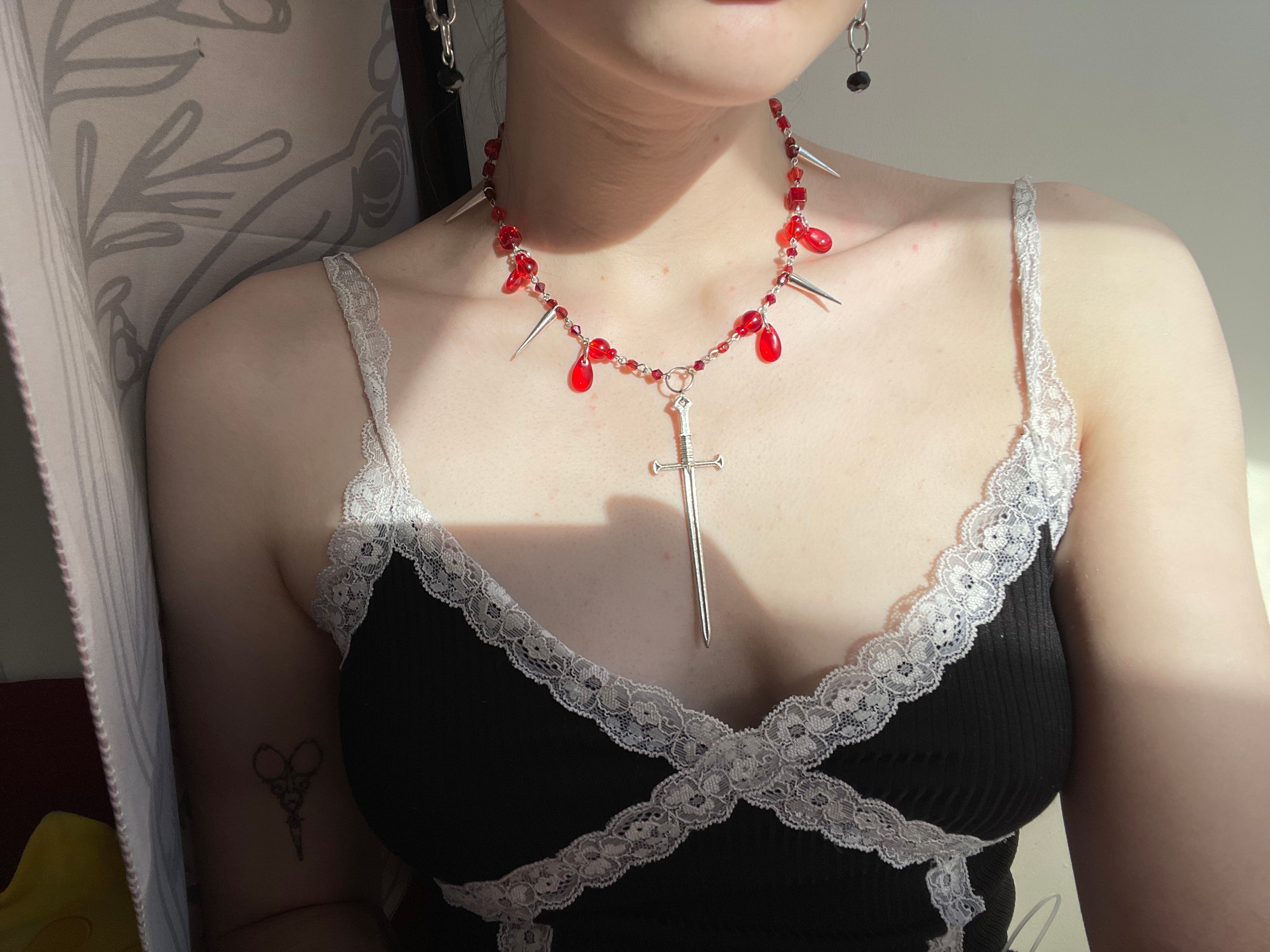 Fall on your sword necklace